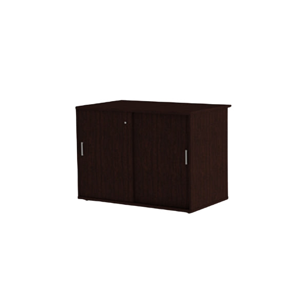 An image of a Credenza – Sliding Door, a desk-height storage unit with a sleek sliding door mechanism, shown in a neutral finish. The unit includes one internal shelf and is designed to complement office spaces with its practical and space-efficient design.