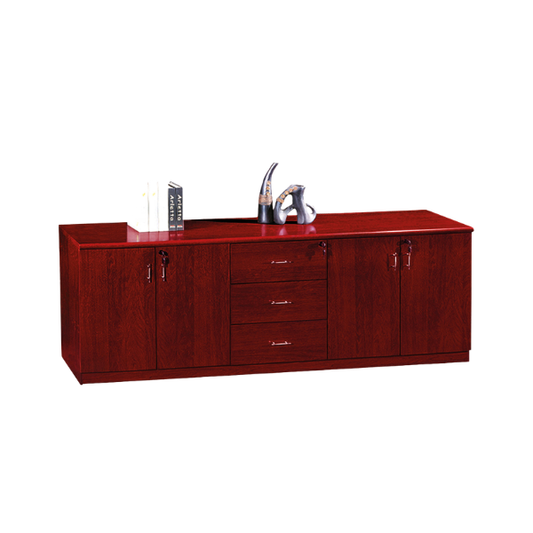 Polished wooden cabinet with a rich reddish-brown finish, featuring two doors on each side and three central drawers with metallic handles. On top, three upright books with “Arletta” visible on their spines are placed to the left, while two decorative sculptures—a curved horn shape and an abstract metallic figure—add a stylish touch to the right, creating a sleek professional look suitable for office or home decor.